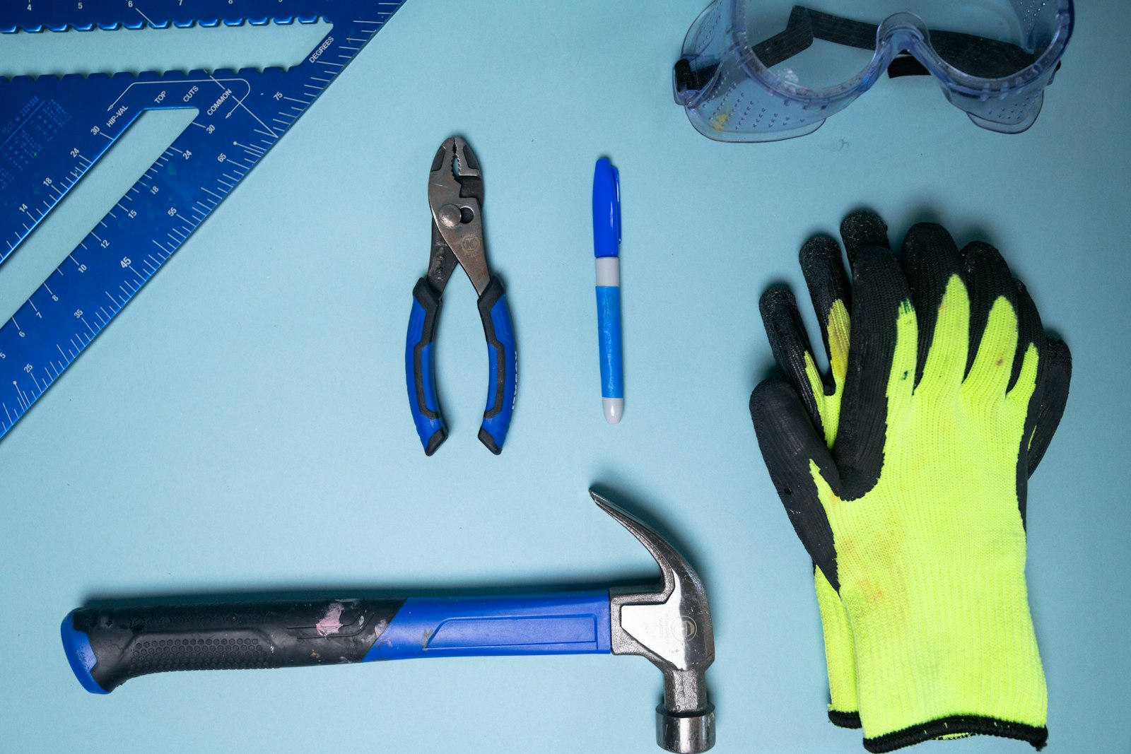 Hand tools and safety gear used for repairs and take-down