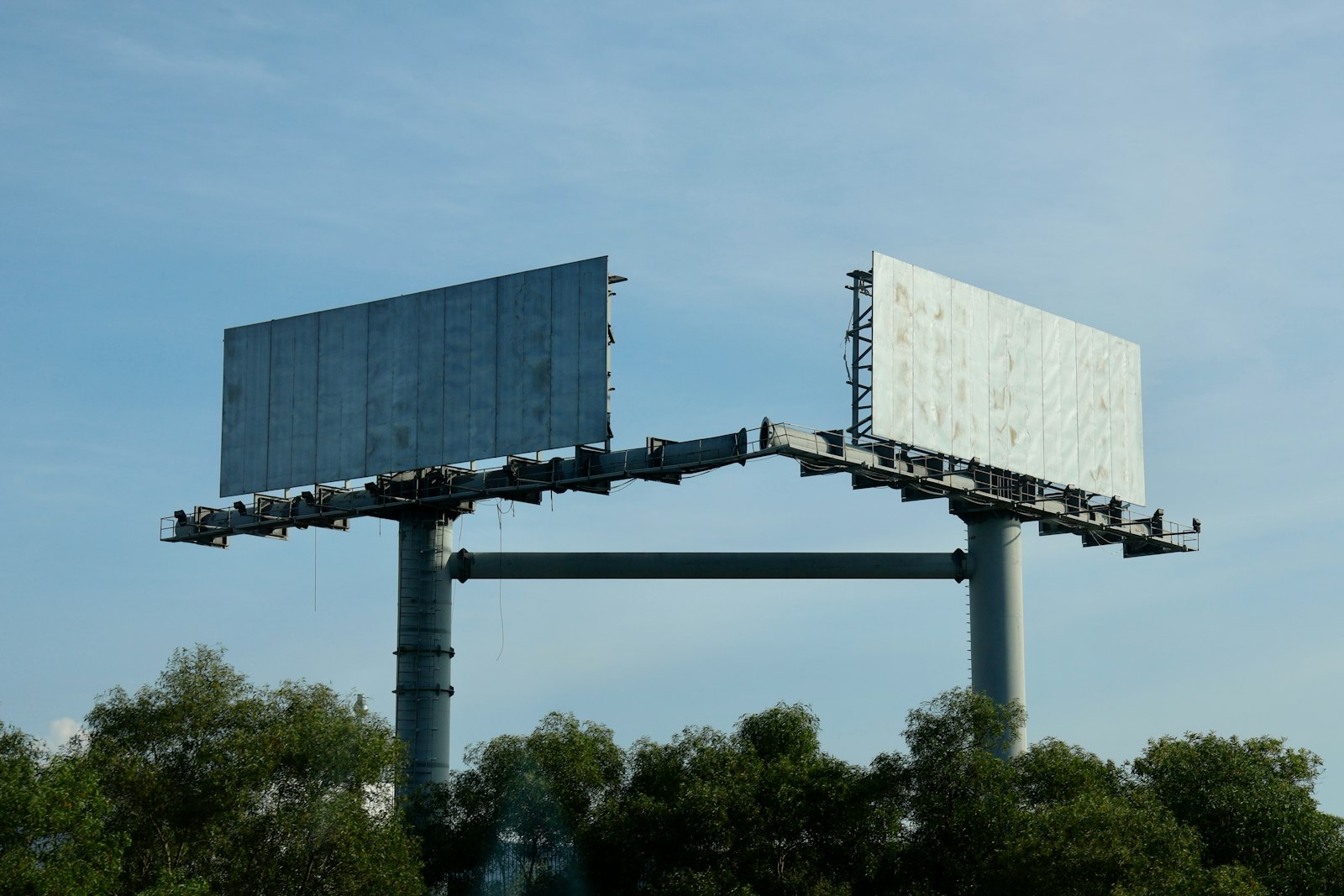 Example of a large-format highway billboard, used to compare roadside and highway advertising in Malaysia